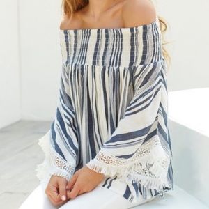 SALE! Super cute and flowy off the shoulder top!